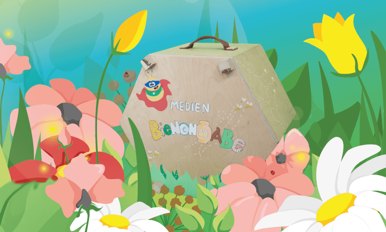 Medienstarter Box auf Blumenwiese